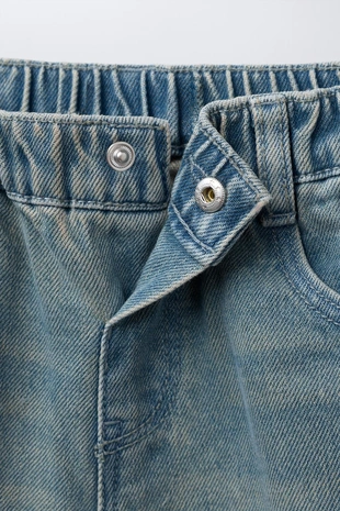 Джинсы свободного кроя с защипами- Заказать в России