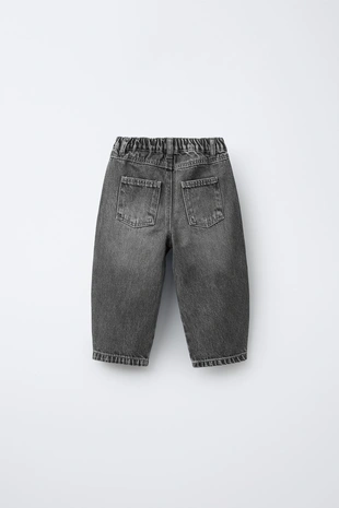 Джинсы свободного кроя с защипами- Заказать в России