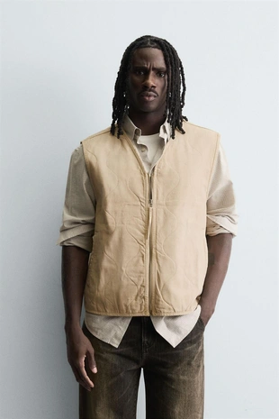 Жилет из хлопка с эффектом потертости и строчкой- Заказать в России