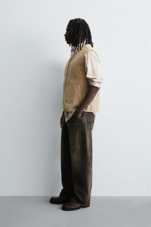 Жилет из хлопка с эффектом потертости и строчкой- Заказать в России