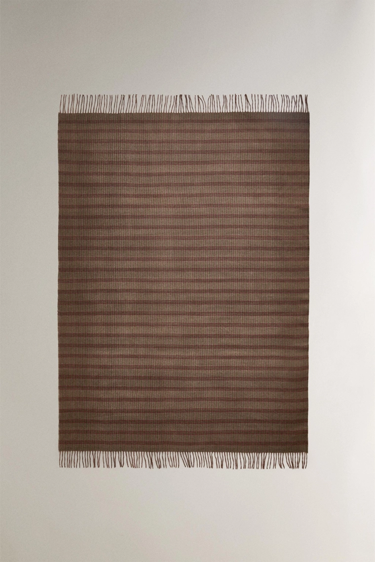 Плед в клетку с бахромой