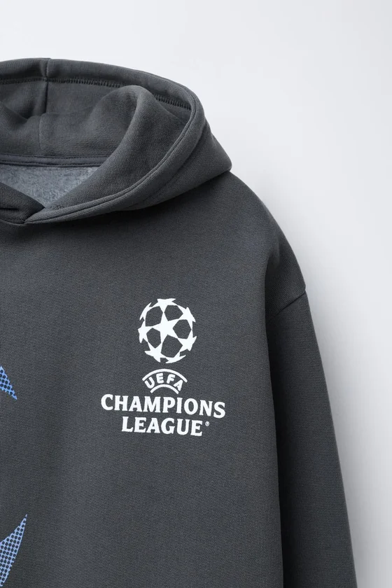 ТОЛСТОВКА С КАПЮШОНОМ UEFA CHAMPIONS LEAGUE ®