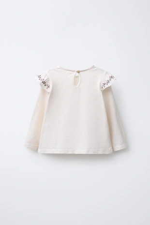 Футболка с воланами и цветочной вышивкой- Заказать в России