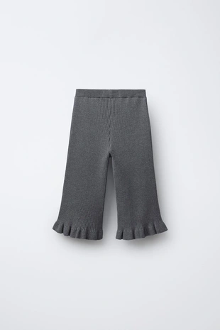 Трикотажные брюки с воланами- Заказать в России