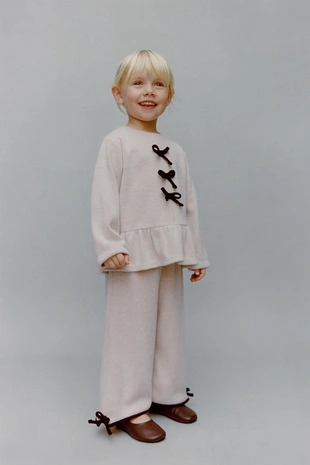 Брюки-кюлоты SOFT TOUCH с контрастным бантом- Заказать в России