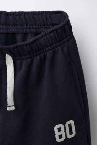 Брюки-джоггеры с принтом