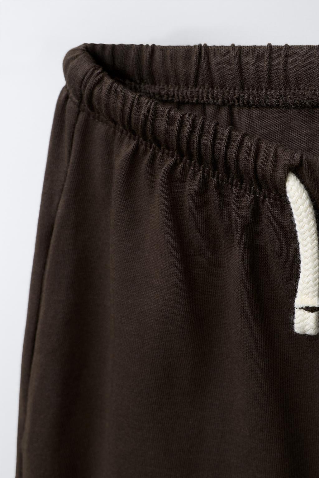 ШИРОКИЕ БРЮКИ ИЗ ПЛОТНОЙ МЯГКОЙ ТКАНИ С ВЫШИВКОЙ