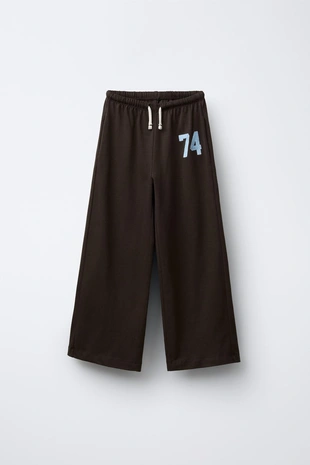 Широкие брюки из плотной мягкой ткани с вышивкой- Заказать в России