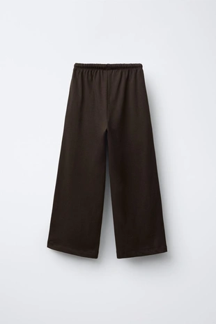 Широкие брюки из плотной мягкой ткани с вышивкой- Заказать в России