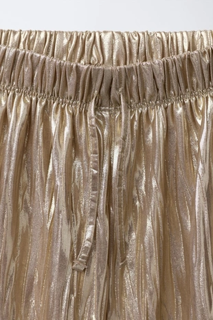 Металлизированные брюки-бомбашки- Заказать в России