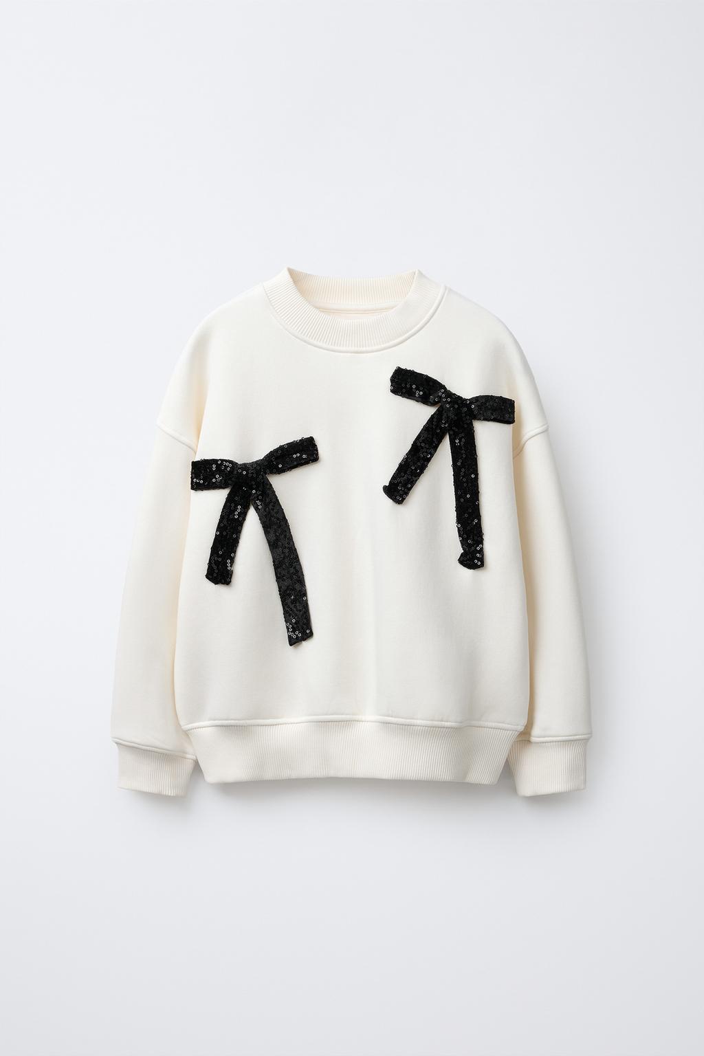 ТОЛСТОВКА С БАНТАМИ И ПАЙЕТКАМИ