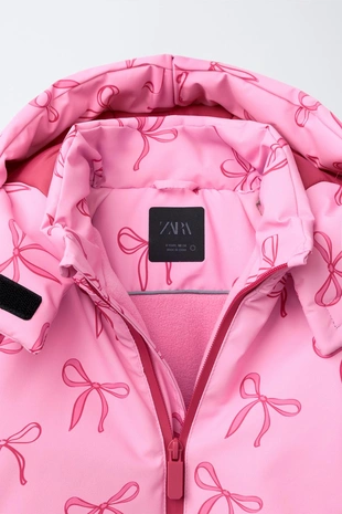 Длинный комбинезон WATER RESISTANT и WINDPROOF с бантами- Заказать в России