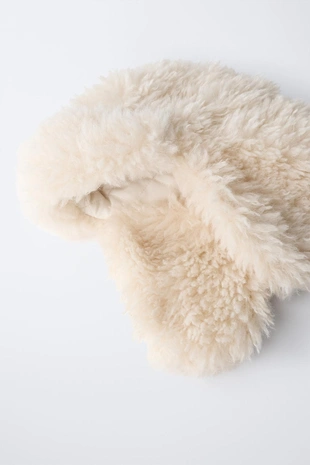 Шапка из искусственного меха коллекции для горнолыжного спорта- Заказать в России