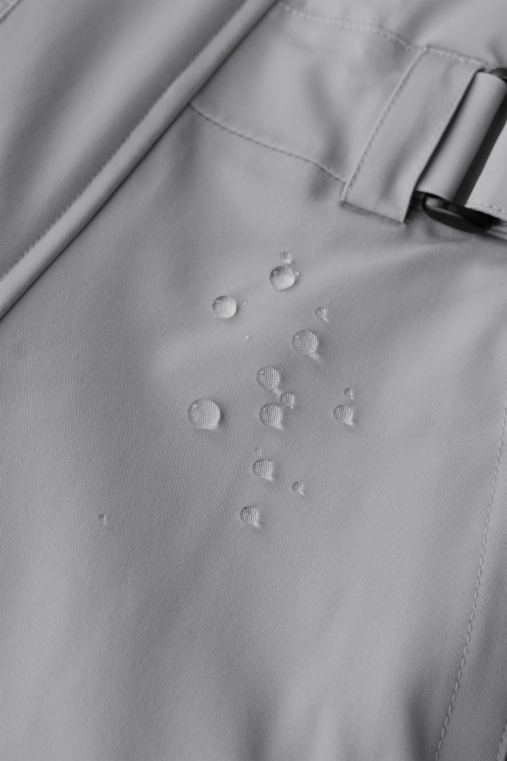 WINDPROOF AND WATER-RESISTANT HOODED JUMPSUIT RECCO® SYSTEM SKI COLLECTION