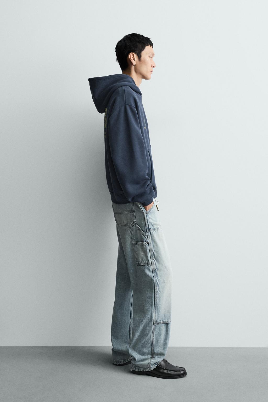 ТОЛСТОВКА С ЭФФЕКТОМ ПОТЕРТОСТИ С НАДПИСЯМИ И ПРИНТАМИ