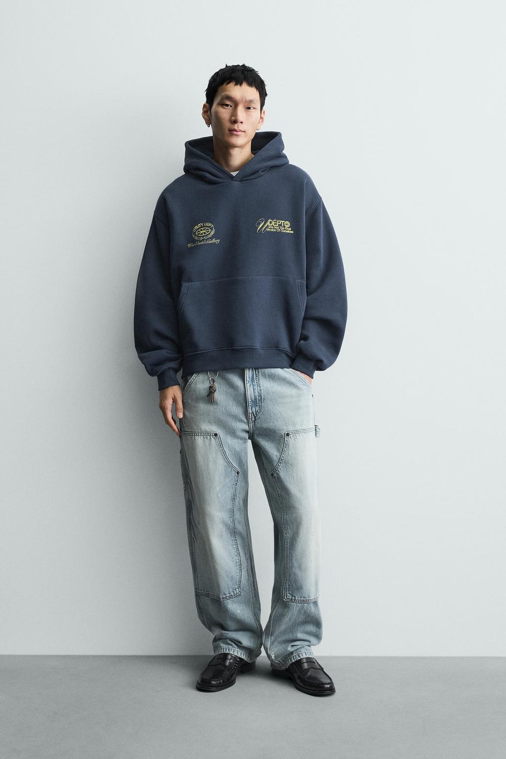 ТОЛСТОВКА С ЭФФЕКТОМ ПОТЕРТОСТИ С НАДПИСЯМИ И ПРИНТАМИ