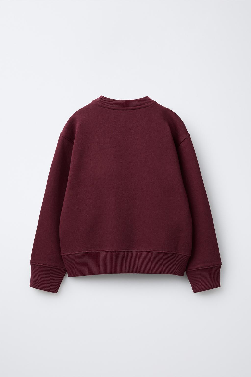 ТОЛСТОВКА С НАДПИСЬЮ И ЭТИКЕТКОЙ