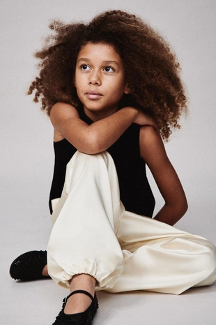 Брюки-бомбашки с цветком- Заказать в России