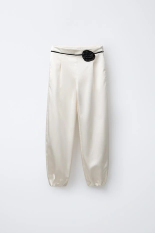 Брюки-бомбашки с цветком- Заказать в России