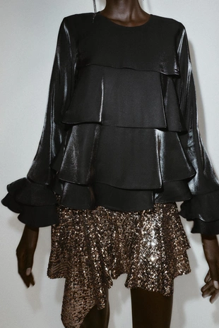 Блуза из блестящей ткани с воланами- Заказать в России
