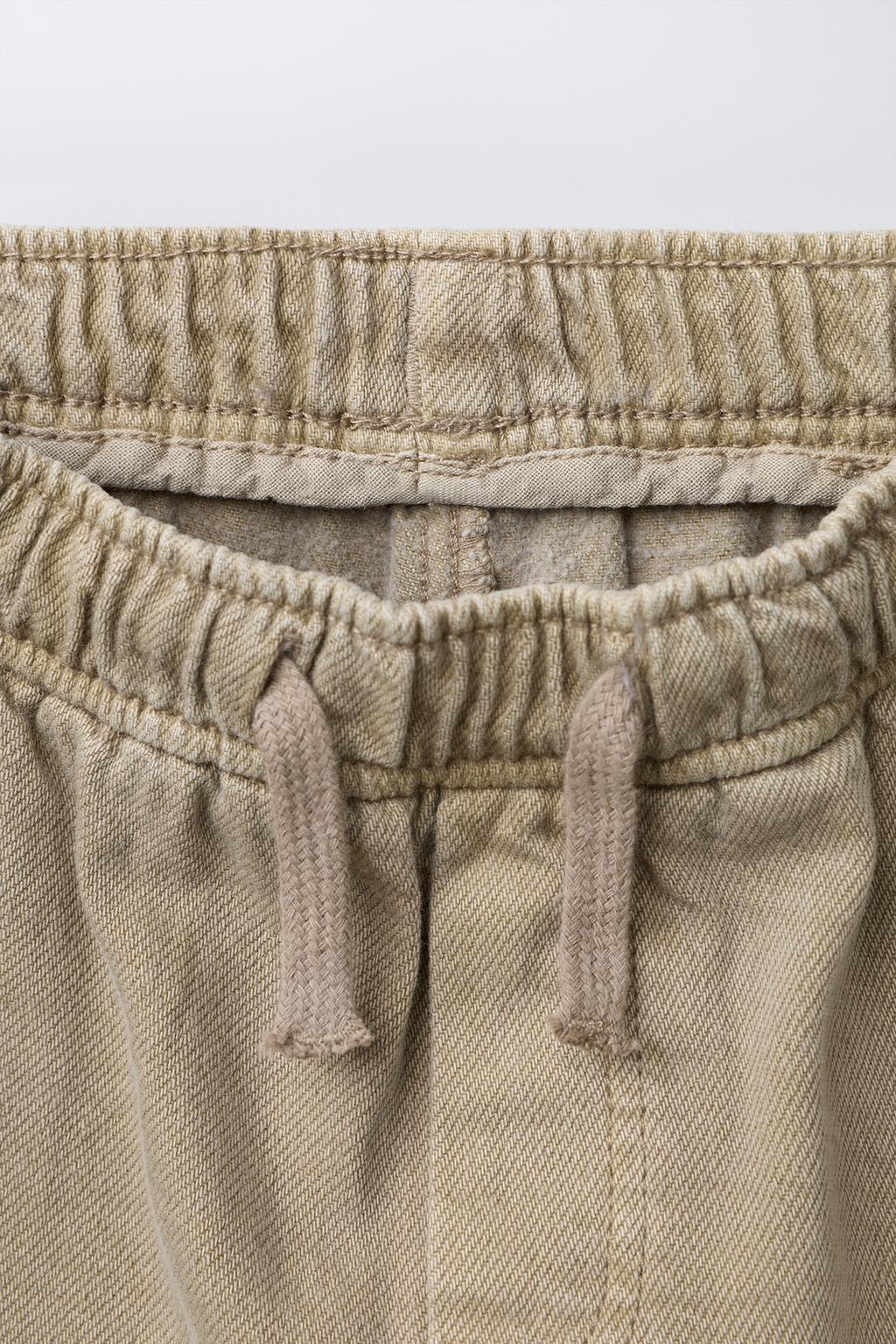 БРЮКИ КАРГО ИЗ САРЖИ С КАРМАНАМИ И ШАХМАТНЫМ ПРИНТОМ