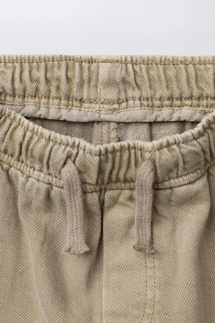 Брюки карго из саржи с карманами и шахматным принтом- Заказать в России