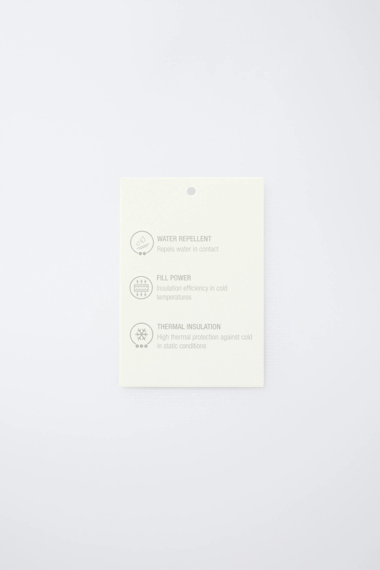 Пуховик с марлевым наполнителем 50% пуха и 50% перьев с этикеткой