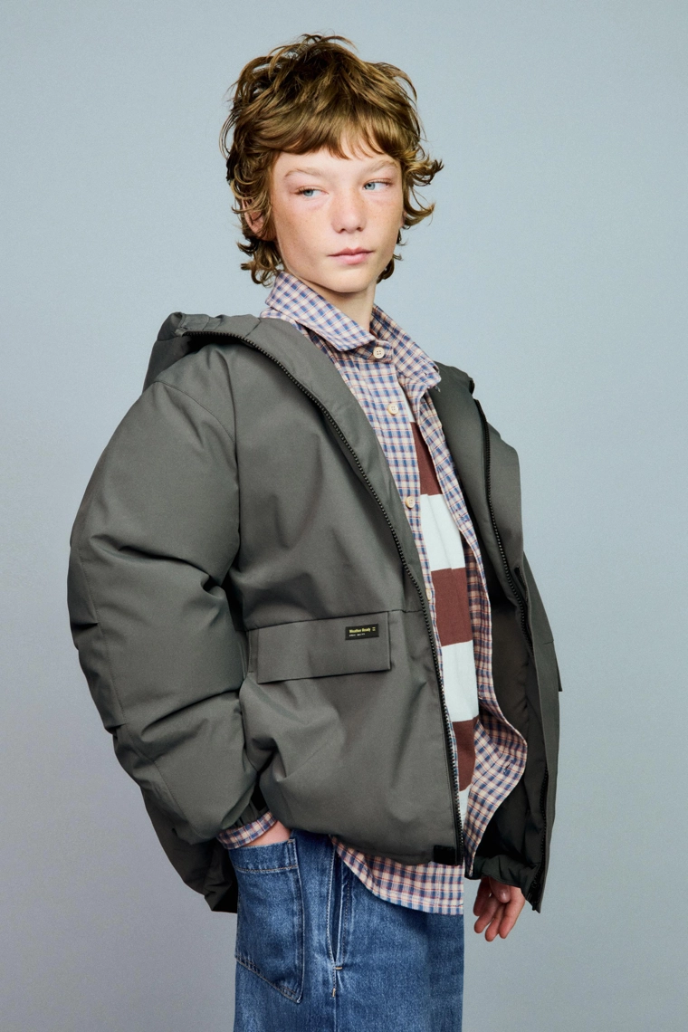 Пуховик с марлевым наполнителем 50% пуха и 50% перьев с этикеткой