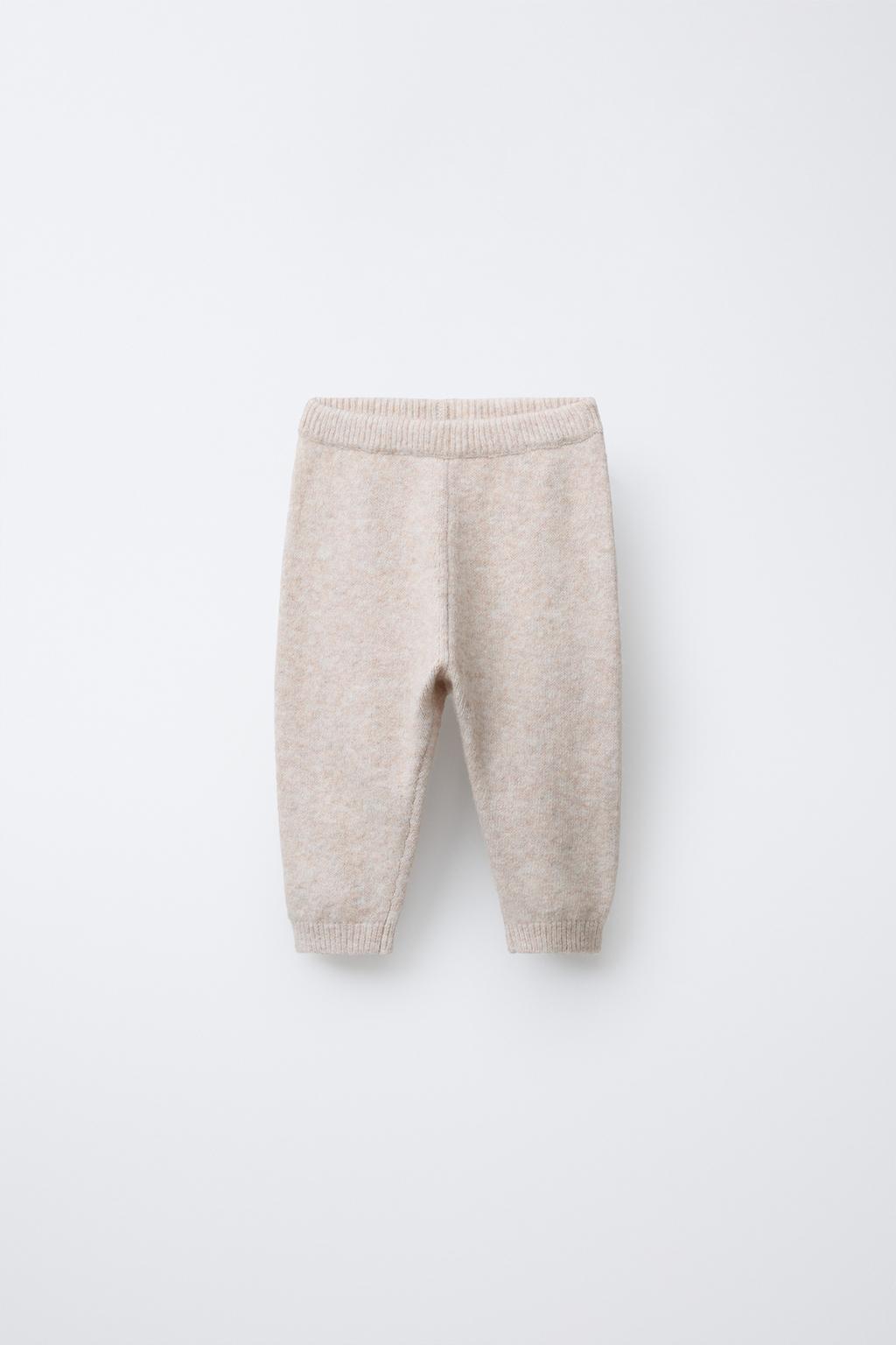 ТРИКОТАЖНЫЕ ЛЕГИНСЫ С КАРМАНОМ И ЭТИКЕТКОЙ С ЕЖИКОМ