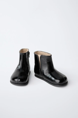 Утепленные кожаные ботинки с тиснением- Заказать в России