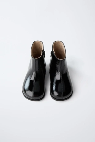 Утепленные кожаные ботинки с тиснением- Заказать в России