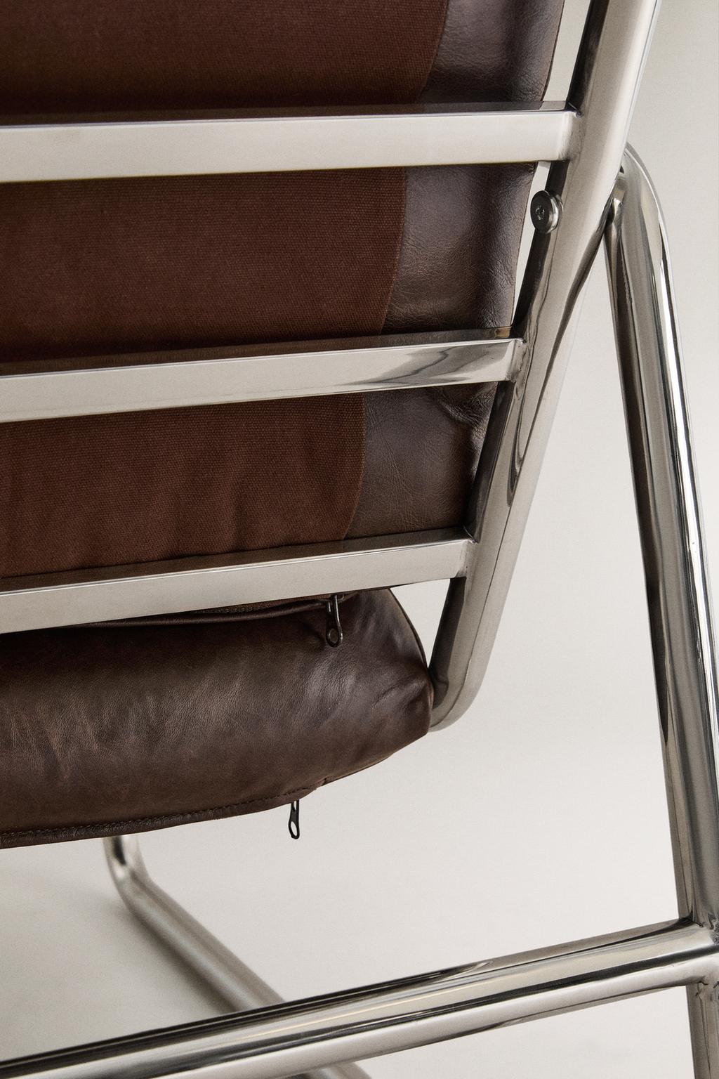 Стул с металлическими и кожаными элементами