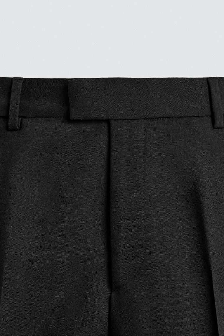 Брюки-клеш ограниченной коллекции из шерстяной ткани