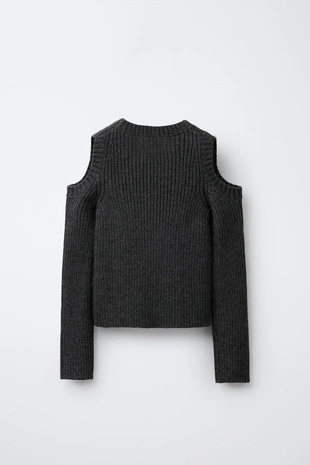 Вязаный свитер с вырезами и вышитой звездой- Заказать в России