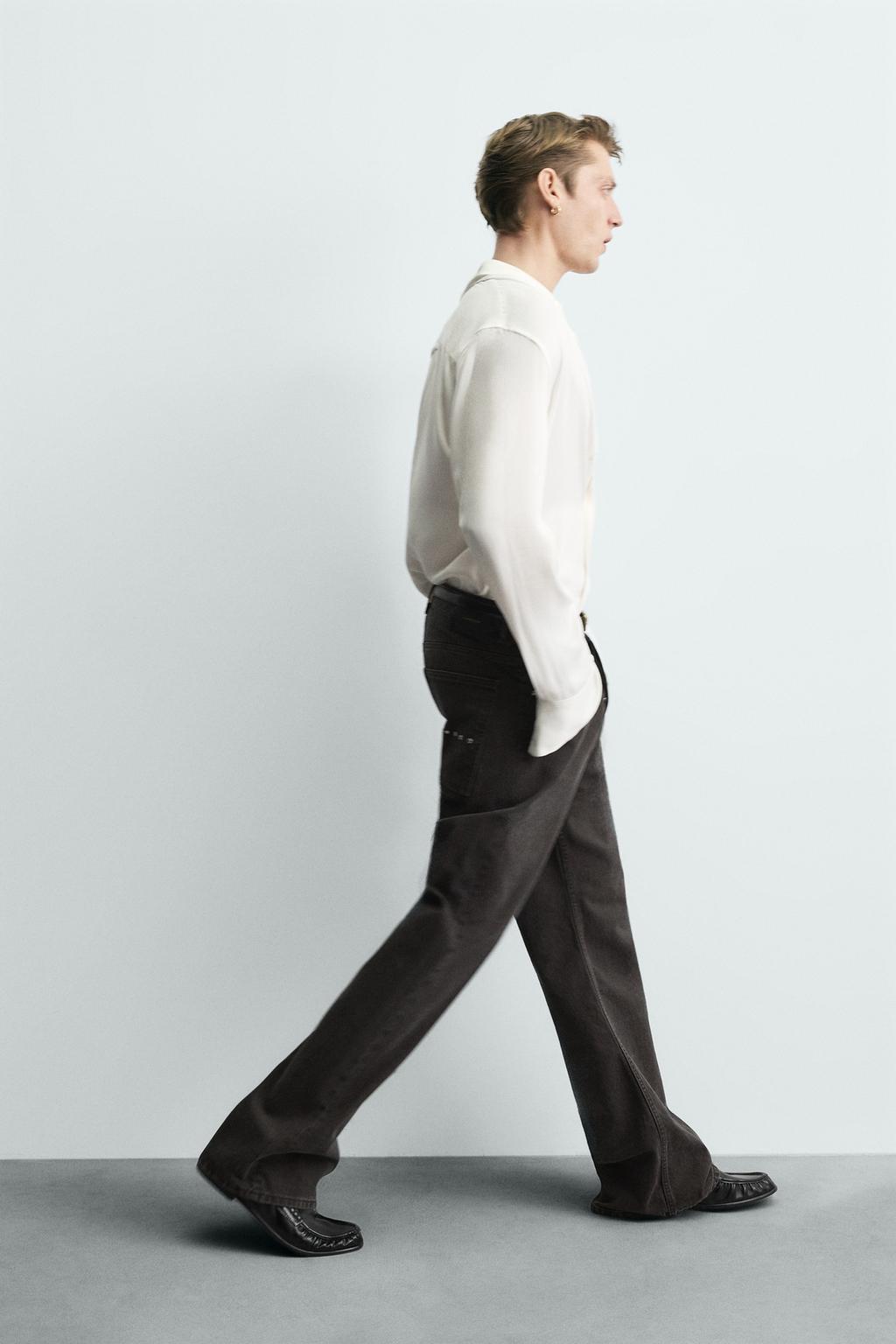 ДЖИНСЫ FLARED С ВОЩЕНЫМ ПОКРЫТИЕМ