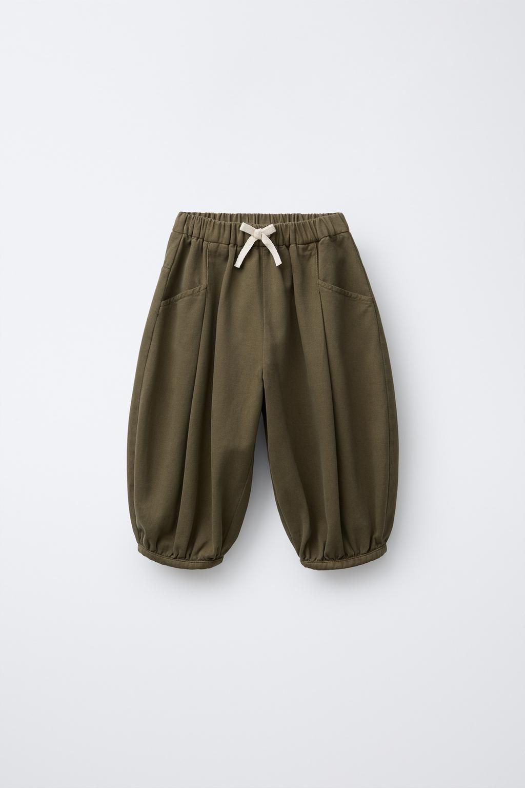 БРЮКИ БАГГИ С ЗАЩИПАМИ