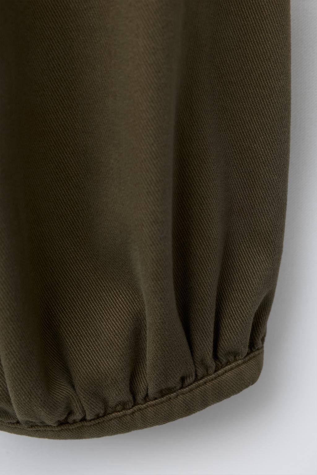 БРЮКИ БАГГИ С ЗАЩИПАМИ