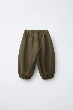 Брюки багги с защипами- Заказать в России