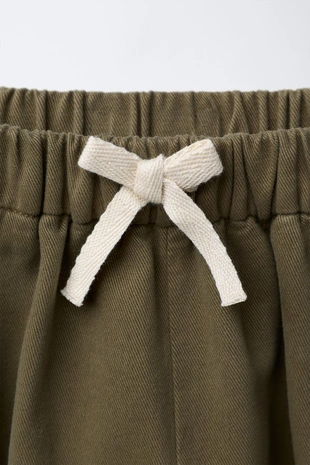 Брюки багги с защипами- Заказать в России