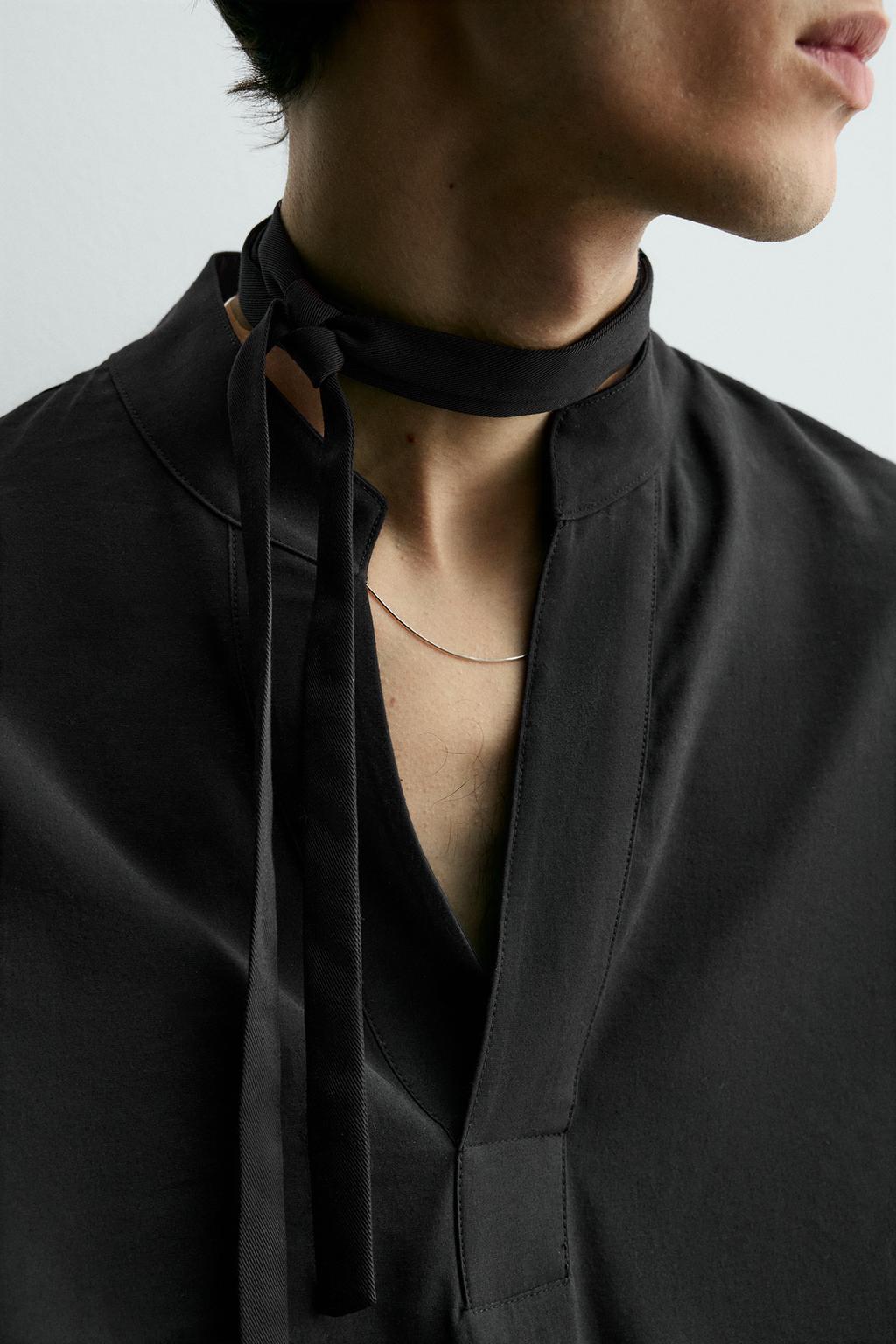 ПОЛО ИЗ СТРУЯЩЕЙСЯ ТКАНИ