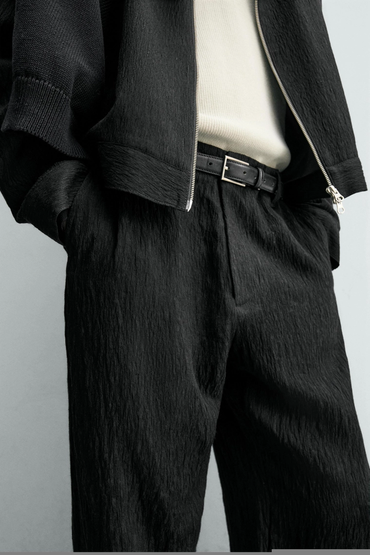 Брюки свободного кроя с неровным рисунком