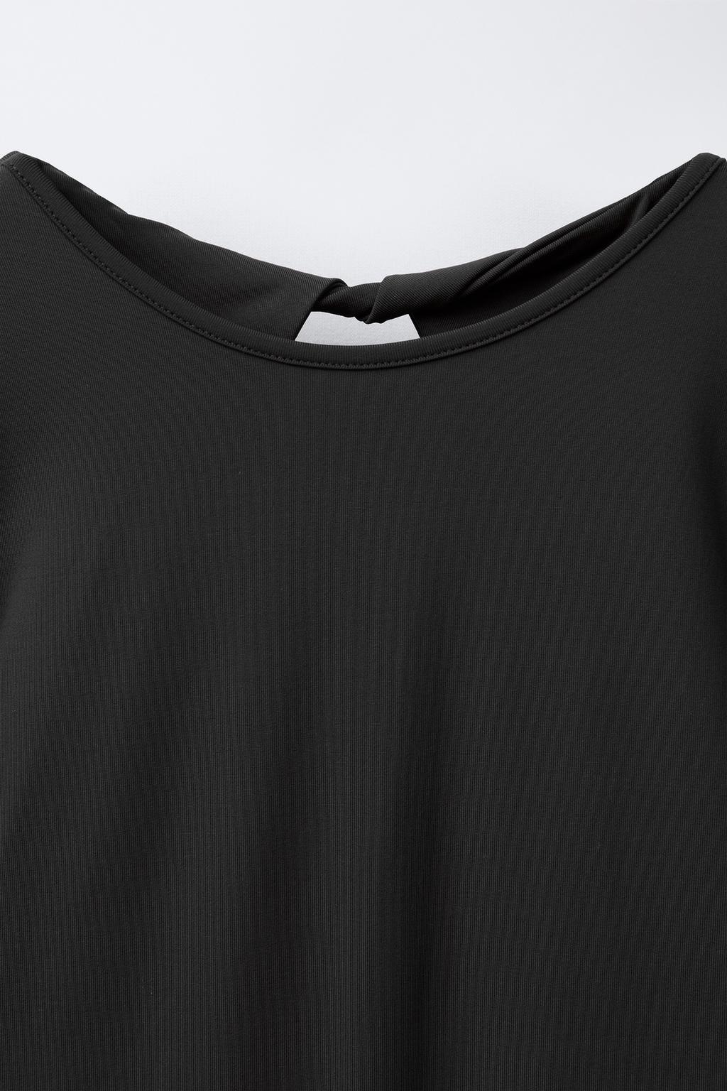 БОДИ ИЗ ПОЛИАМИДА С ВЫРЕЗАМИ