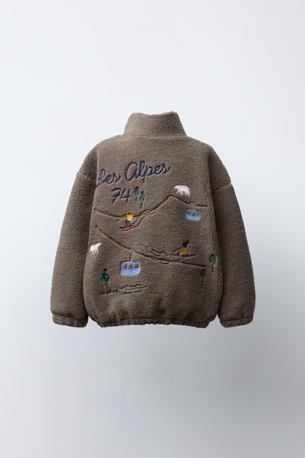 КУРТКА ИЗ ИСКУССТВЕННОЙ ОВЧИНЫ С ВЫШИВКОЙ