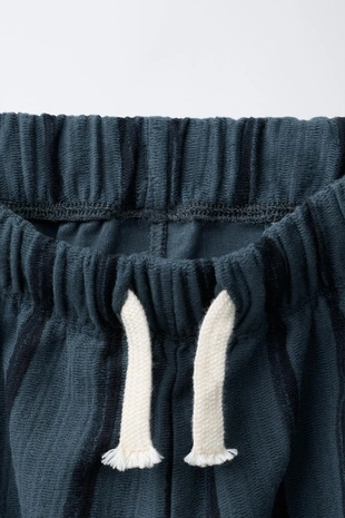 Прямые брюки в полоску- Заказать в России