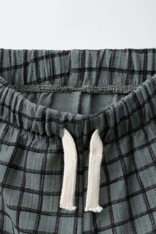 Прямые брюки в клетку- Заказать в России