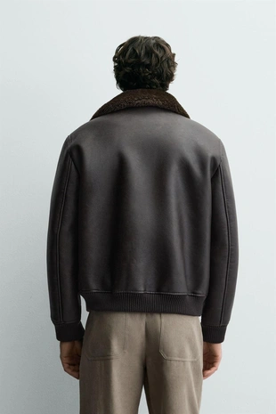 Куртка из искусственной кожи с комбинированным воротником- Заказать в России