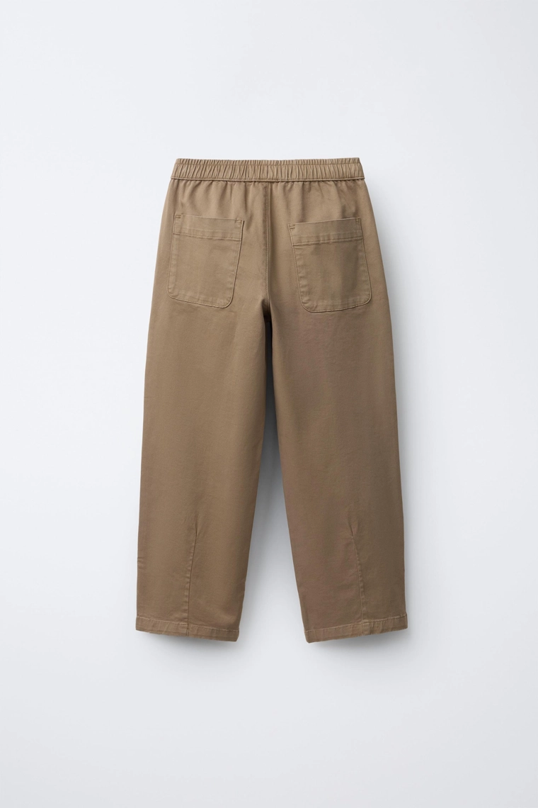 Прямые брюки с защипами