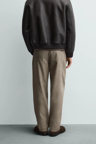 Брюки чинос с эффектом потертости- Заказать в России