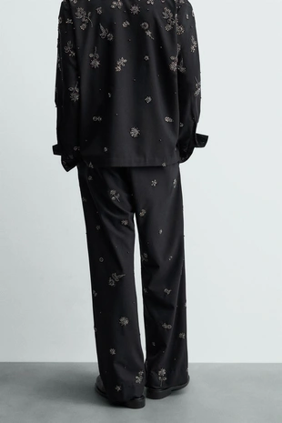 Брюки свободного кроя с пайетками LIMITED EDITION- Заказать в России