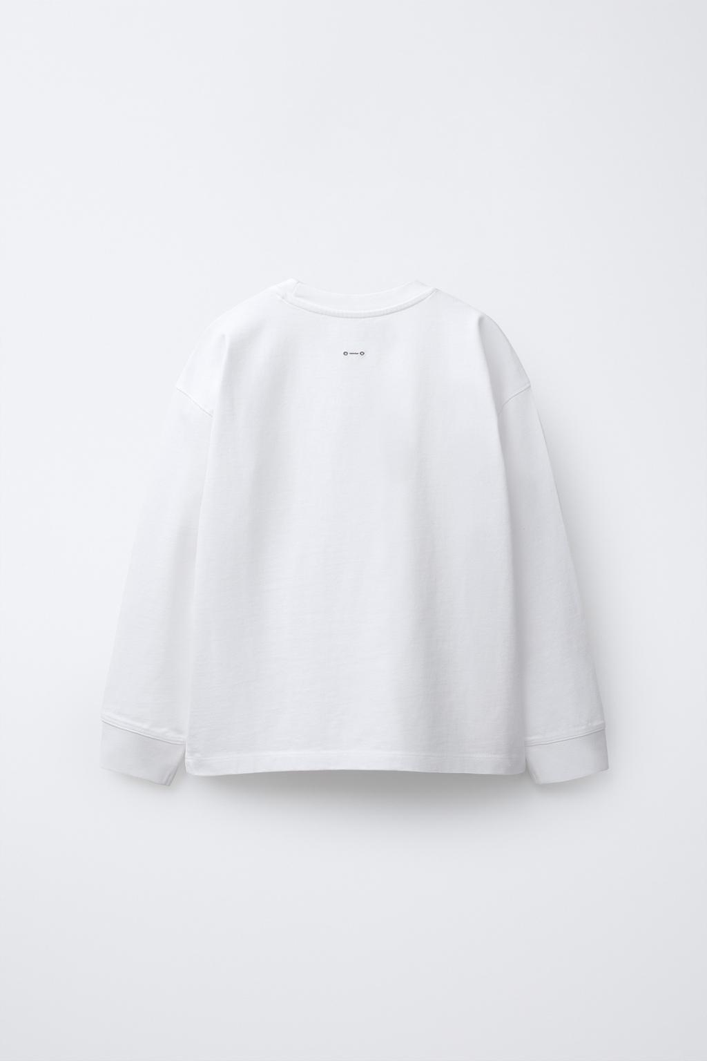 ФУТБОЛКА ИЗ ПЛОТНОЙ ТКАНИ С ЭФФЕКТОМ ПОТЕРТОСТИ